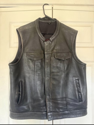 First mfg leather vest - first, sharp