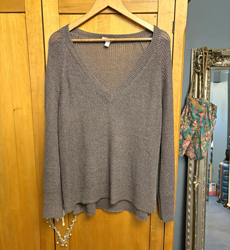 White company jumper with gold